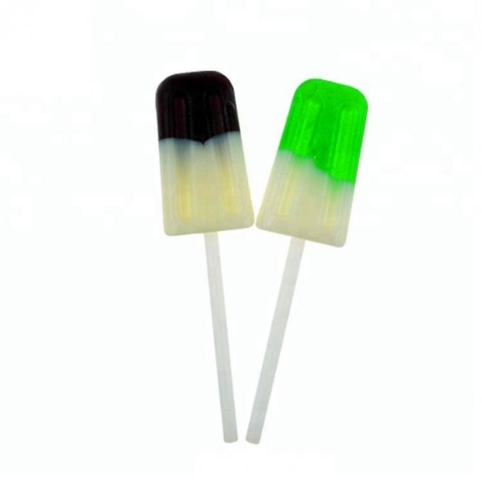 Φως επάνω στη μορφή παγωτού Lollipops φρούτων με τη βιομηχανία ζαχαρωδών προϊόντων παιχνιδιών λιβελλουλών